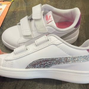 Girls Puma shoes size 12 never worn.